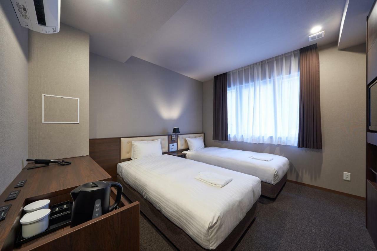 Welina Hotel Premier Shinsaibashi Osaka Bagian luar foto
